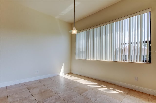 1531 Ember Ln, Tarpon Springs, FL 34689 - tiled spare room with baseboards