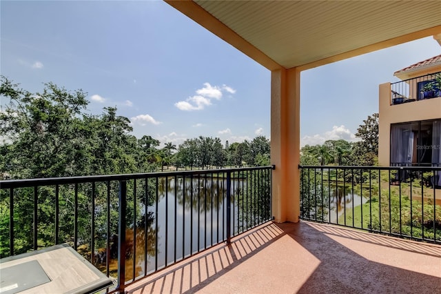 1531 Ember Ln, Tarpon Springs, FL 34689 - balcony with a water view and view of scattered trees