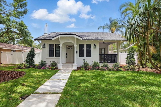 791 44th Ave N, Saint Petersburg, FL 33703 - bungalow featuring a porch, stucco siding, and a ceiling fan