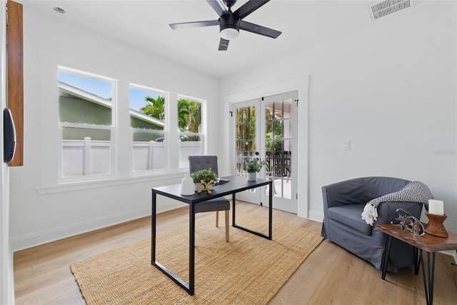 791 44th Ave N, Saint Petersburg, FL 33703 - office area with light wood-style flooring, baseboards, and a ceiling fan