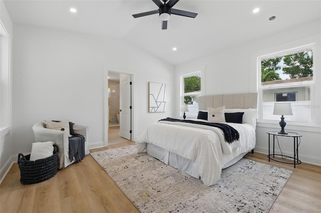 791 44th Ave N, Saint Petersburg, FL 33703 - bedroom featuring wood finished floors, vaulted ceiling, recessed lighting, ensuite bath, and a ceiling fan