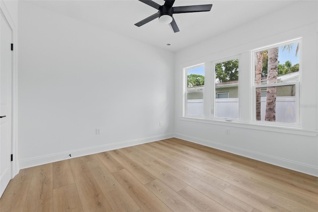 791 44th Ave N, Saint Petersburg, FL 33703 - unfurnished room with baseboards, light wood-type flooring, and a ceiling fan