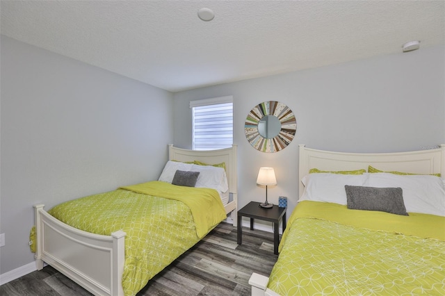 6512 Trent Creek Dr, Sun City Center, FL 33573 - bedroom with wood finished floors and baseboards