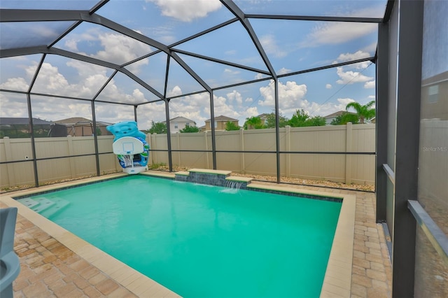 6512 Trent Creek Dr, Sun City Center, FL 33573 - view of swimming pool featuring a fenced backyard and glass enclosure