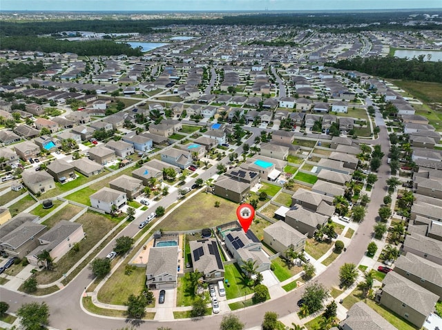 6512 Trent Creek Dr, Sun City Center, FL 33573 - aerial view of property's location with nearby suburban area and a large body of water
