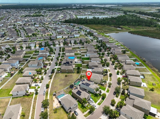 6512 Trent Creek Dr, Sun City Center, FL 33573 - aerial view of property's location featuring a nearby body of water and nearby suburban area