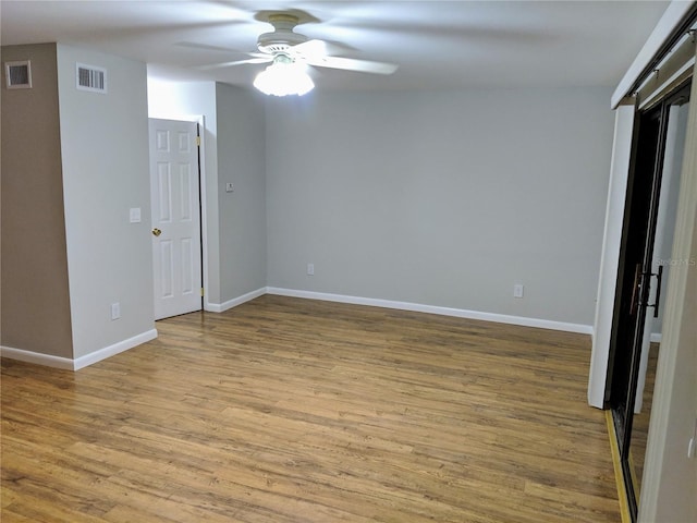1515 Bayshore Blvd Unit 38, Dunedin, FL 34698 - unfurnished room featuring a ceiling fan and wood finished floors