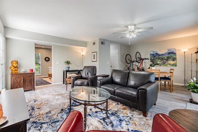 1515 Bayshore Blvd Unit 38, Dunedin, FL 34698 - living room featuring wood finished floors and ceiling fan