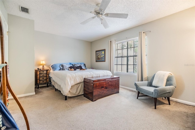1515 Bayshore Blvd Unit 38, Dunedin, FL 34698 - bedroom with light colored carpet, a textured ceiling, and ceiling fan