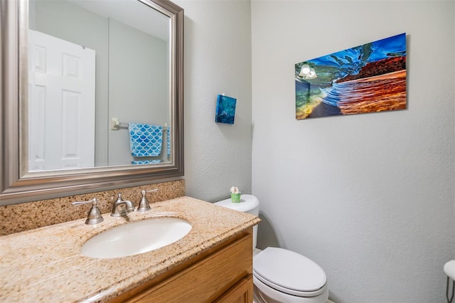 1515 Bayshore Blvd Unit 38, Dunedin, FL 34698 - bathroom featuring a textured wall and vanity
