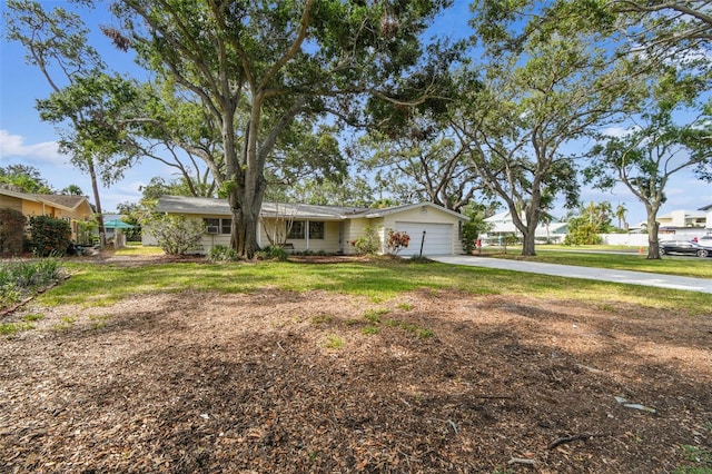 5825 Oakhurst Dr, Seminole, FL 33772 - ranch-style house with a garage and driveway