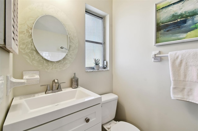 5825 Oakhurst Dr, Seminole, FL 33772 - half bathroom with toilet and vanity