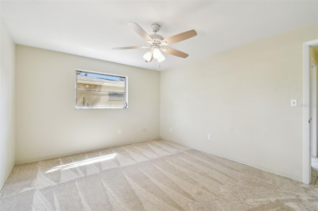5825 Oakhurst Dr, Seminole, FL 33772 - carpeted spare room with ceiling fan and baseboards
