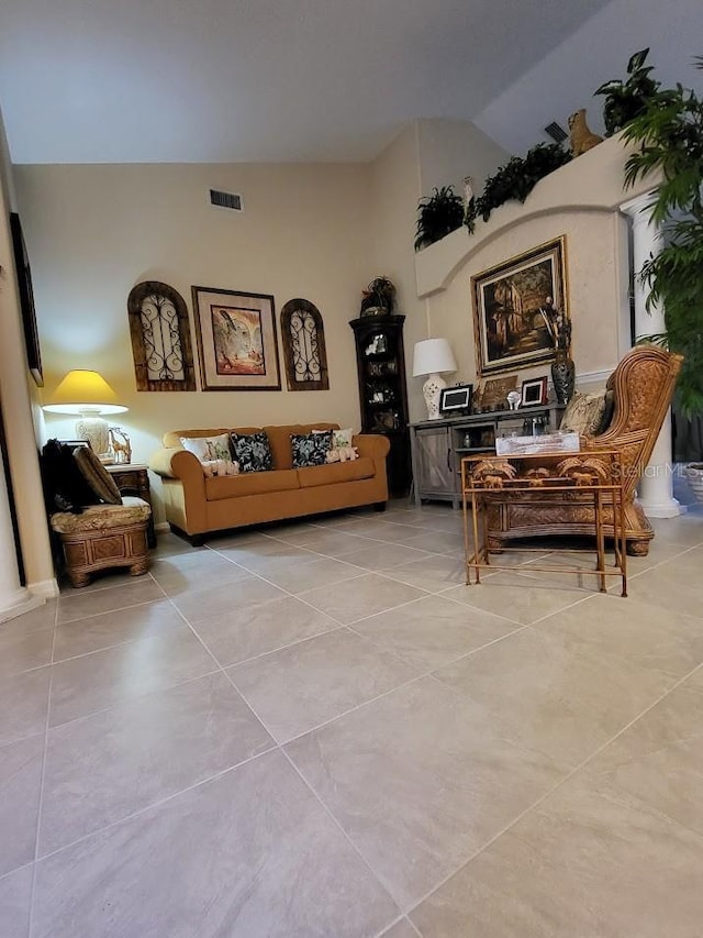 4471 Marsh Harbor Dr, Tavares, FL 32778 - living area with light tile patterned floors and high vaulted ceiling