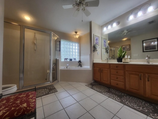 4471 Marsh Harbor Dr, Tavares, FL 32778 - bathroom featuring a ceiling fan, tile patterned floors, a bath, double vanity, and a stall shower