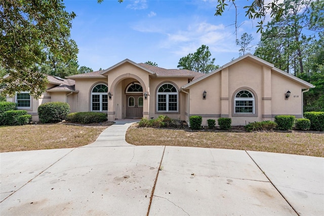 8518 N Linwood Loop, Citrus Springs, FL 34433 - mediterranean / spanish-style house featuring stucco siding