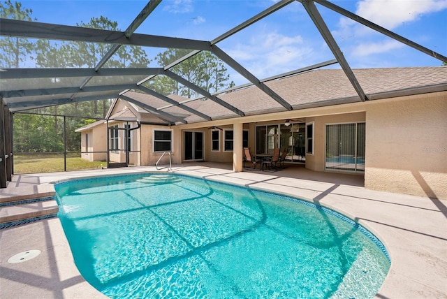 8518 N Linwood Loop, Citrus Springs, FL 34433 - swimming pool with ceiling fan, a patio area, and glass enclosure