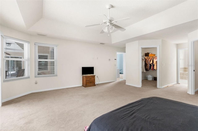 8518 N Linwood Loop, Citrus Springs, FL 34433 - bedroom featuring light carpet, baseboards, a walk in closet, and a closet