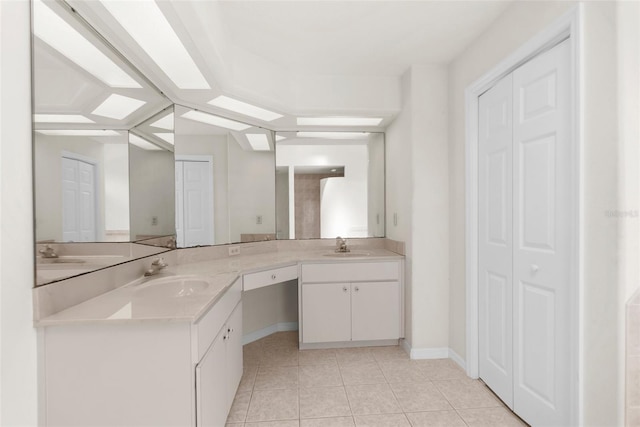8518 N Linwood Loop, Citrus Springs, FL 34433 - full bathroom featuring a closet, double vanity, tile patterned floors, and baseboards