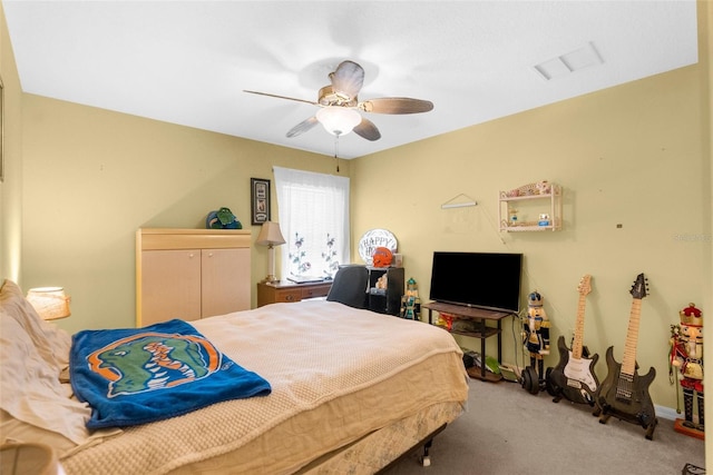 8518 N Linwood Loop, Citrus Springs, FL 34433 - bedroom with light carpet, a ceiling fan, and baseboards