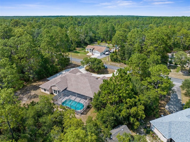 8518 N Linwood Loop, Citrus Springs, FL 34433 - view from above of property with a heavily wooded area and a pool