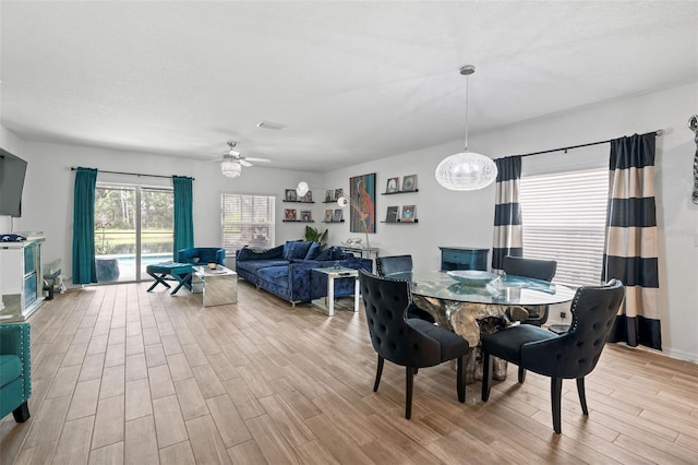 5511 Badini Way, Palmetto, FL 34221 - dining room with wood finished floors and ceiling fan