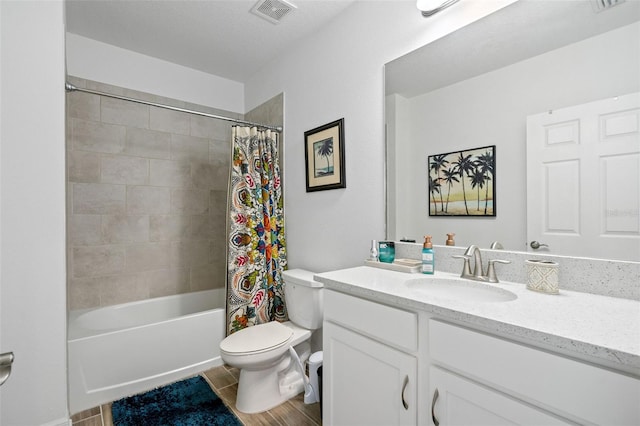5511 Badini Way, Palmetto, FL 34221 - full bath featuring vanity, toilet, wood finished floors, and shower / bath combo