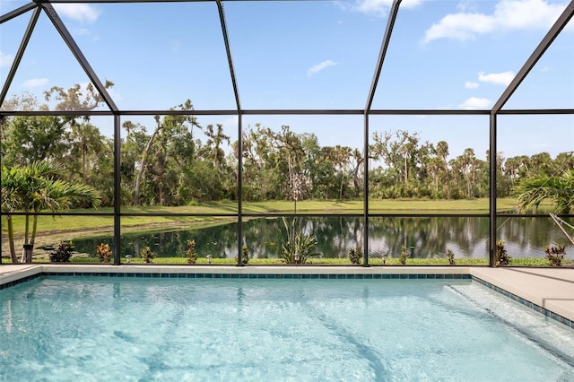 5511 Badini Way, Palmetto, FL 34221 - outdoor pool featuring a water view, view of scattered trees, and a lanai