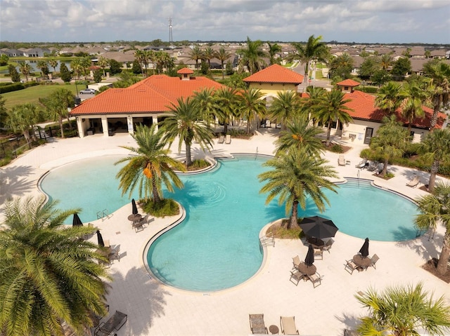 5511 Badini Way, Palmetto, FL 34221 - community pool featuring a residential view and a patio area