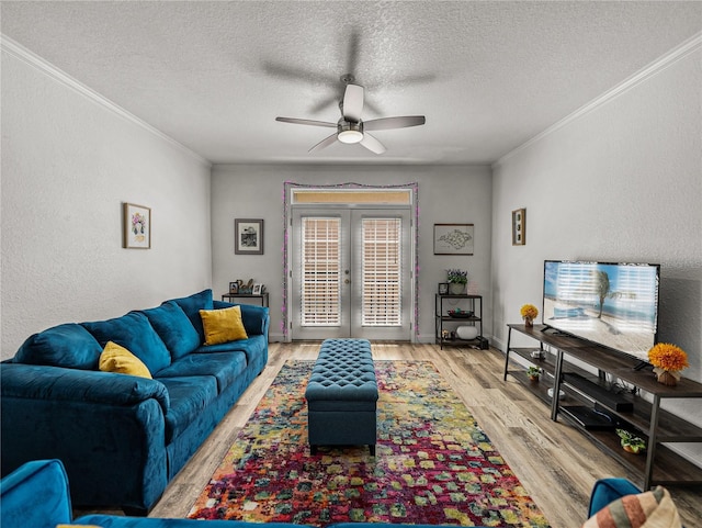 4221 W Spruce St Unit 2302, Tampa, FL 33607 - living area featuring french doors, ceiling fan, crown molding, a textured ceiling, and wood finished floors