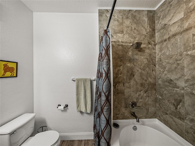 4221 W Spruce St Unit 2302, Tampa, FL 33607 - bathroom with shower / bath combination with curtain, toilet, wood finished floors, baseboards, and a textured ceiling