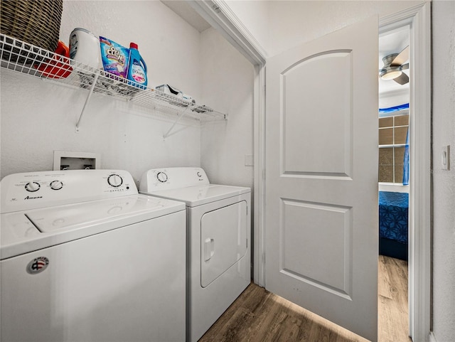 4221 W Spruce St Unit 2302, Tampa, FL 33607 - laundry area featuring dark wood-style flooring, independent washer and dryer, and a ceiling fan