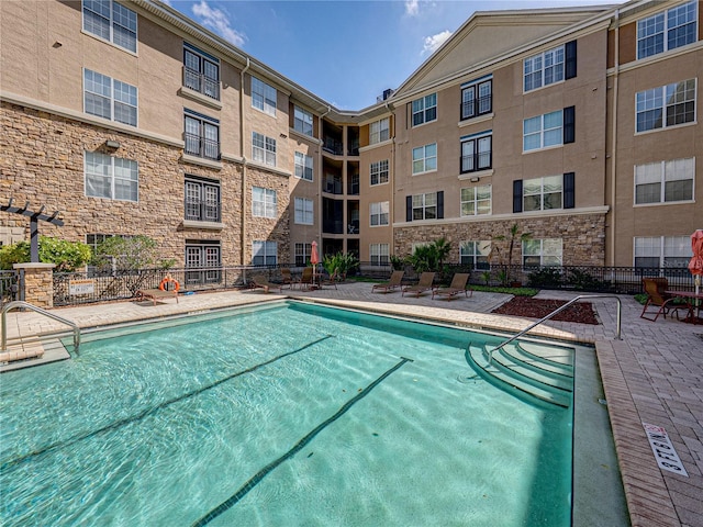 4221 W Spruce St Unit 2302, Tampa, FL 33607 - community pool with a patio area