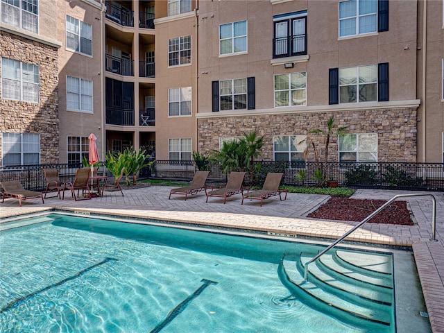 4221 W Spruce St Unit 2302, Tampa, FL 33607 - community pool with a patio