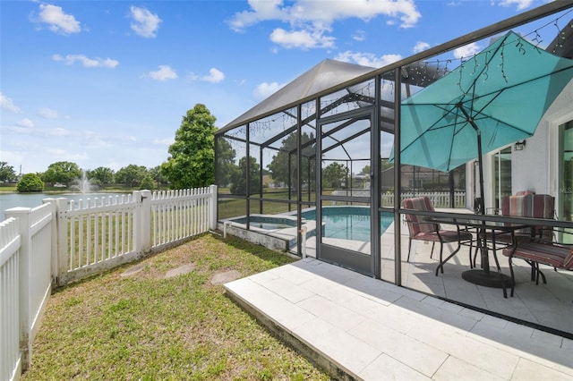 12102 Steppingstone Blvd, Tampa, FL 33635 - view of yard featuring a patio area, a lanai, a pool with connected hot tub, and a water view