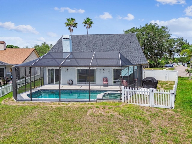 12102 Steppingstone Blvd, Tampa, FL 33635 - back of house with a gate, a patio, glass enclosure, a shingled roof, and a pool with connected hot tub