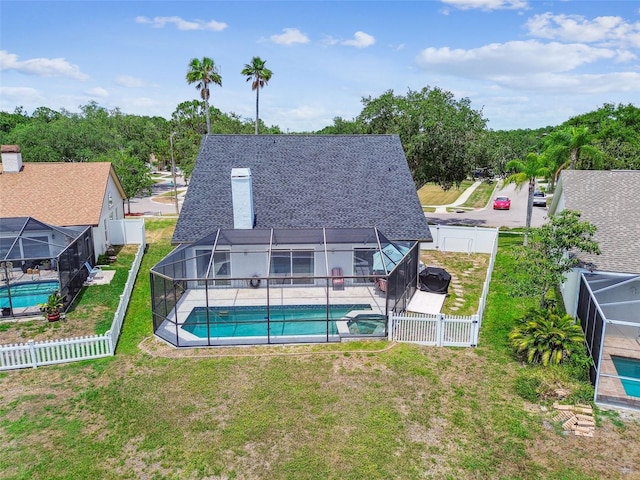 12102 Steppingstone Blvd, Tampa, FL 33635 - view of swimming pool featuring a lanai, a patio area, and a pool with connected hot tub