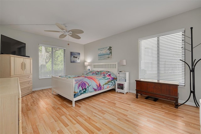 3114 Lake Pine Way Unit G1, Tarpon Springs, FL 34688 - bedroom with light wood-type flooring, baseboards, and ceiling fan