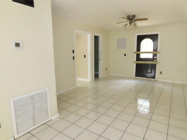 5736 116th Ave N, Pinellas Park, FL 33782 - unfurnished room with light tile patterned floors, ceiling fan, and baseboards