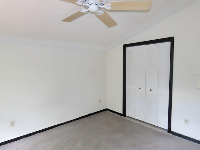 5736 116th Ave N, Pinellas Park, FL 33782 - unfurnished bedroom featuring vaulted ceiling, carpet flooring, baseboards, a ceiling fan, and a closet