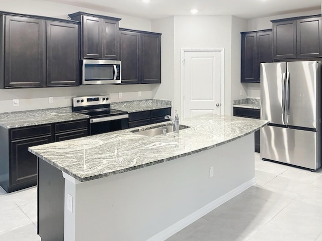 13014 Willow Grove Dr, Riverview, FL 33579 - kitchen with appliances with stainless steel finishes, a sink, light stone counters, and recessed lighting