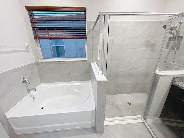 13014 Willow Grove Dr, Riverview, FL 33579 - full bathroom featuring a garden tub, a shower stall, and vanity
