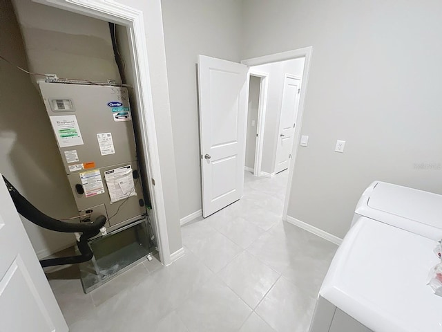 13014 Willow Grove Dr, Riverview, FL 33579 - washroom with baseboards and light tile patterned flooring