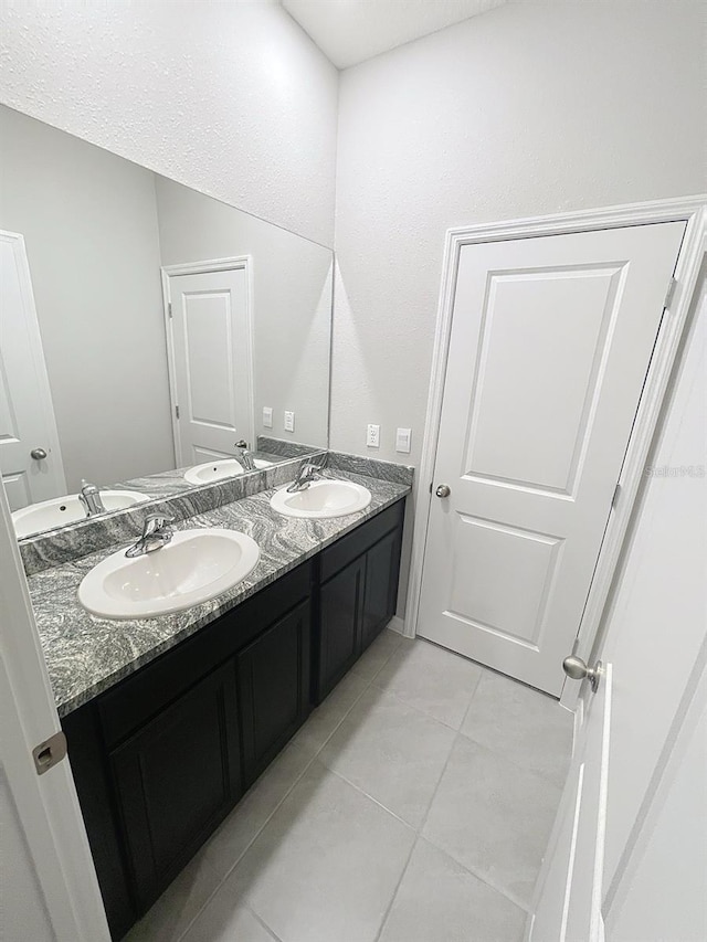13014 Willow Grove Dr, Riverview, FL 33579 - bathroom with double vanity and tile patterned flooring