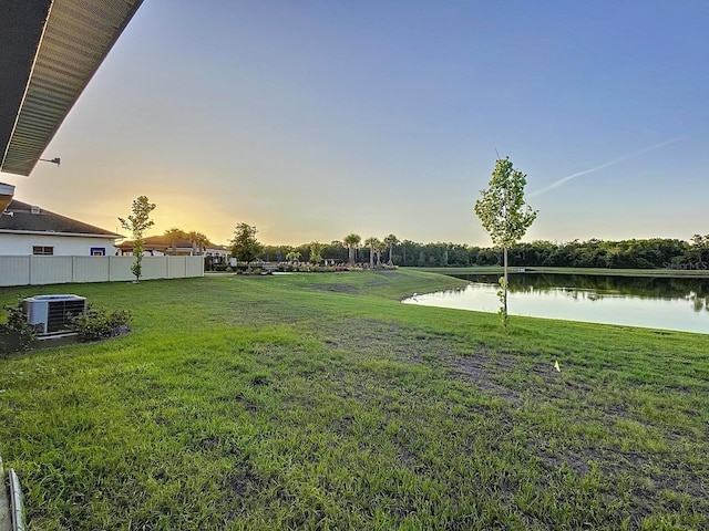 13014 Willow Grove Dr, Riverview, FL 33579 - view of yard featuring a water view and central AC