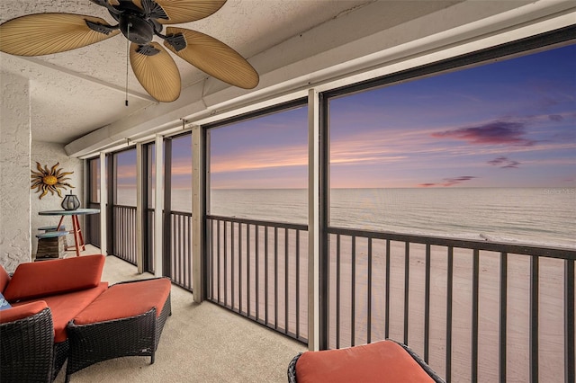 14900 Gulf Blvd Unit 308, Madeira Beach, FL 33708 - sunroom / solarium featuring view of water and beach