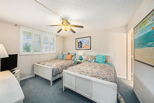 14900 Gulf Blvd Unit 308, Madeira Beach, FL 33708 - carpeted bedroom featuring a textured ceiling, a ceiling fan, and baseboards
