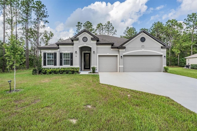5 Sweetgum Ct N, Homosassa, FL 34446 - view of front of home featuring stucco siding, concrete driveway, an attached garage, a front yard, and roof with shingles
