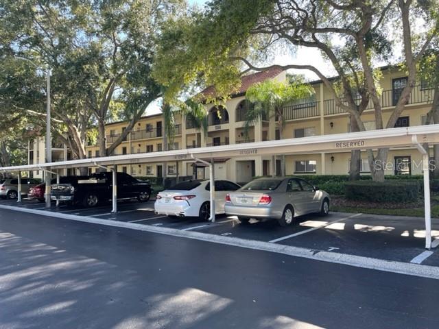 3077 Casa Del Sol Cir Unit 207, Clearwater, FL 33761 - view of covered parking lot
