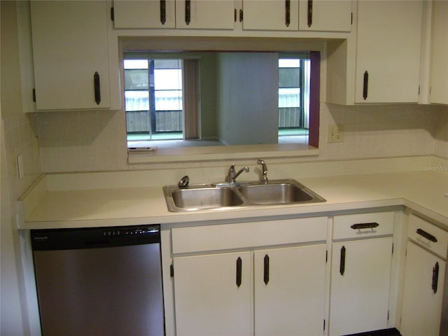 3077 Casa Del Sol Cir Unit 207, Clearwater, FL 33761 - kitchen featuring stainless steel dishwasher, a sink, light countertops, and decorative backsplash